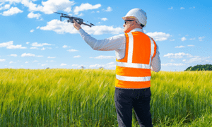 surveyor engineer is holding drone